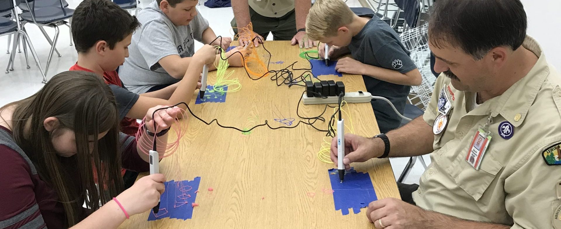 Scouts working on a craft